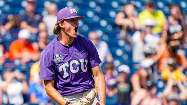 TCU Horned Frogs pitcher Ben Abeldt (46) celebrates after defeating the Virginia Cavaliers at Charles Schwab Field Omaha. 